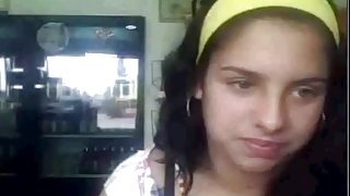 Cute little Latina teen tempts with her tits on camchat