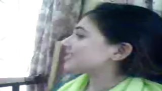Adorable Pakistani wife kisses her fashionable spouse