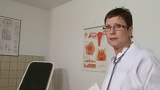 Mature European doctor dildoing her old cunt in the hospital