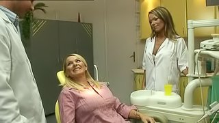 Hot Lesbian Dentist Fucks Her Patient And Gets Joined By Her Colleague